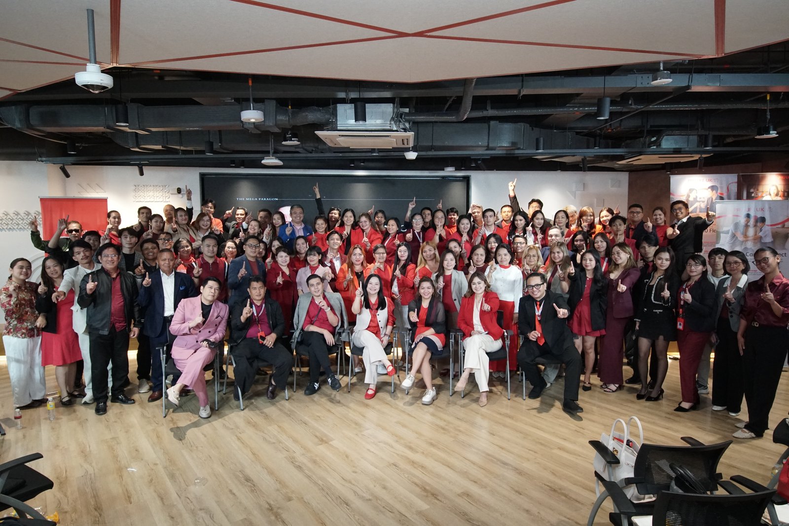 The Mega Paragon team gathered together at a team event