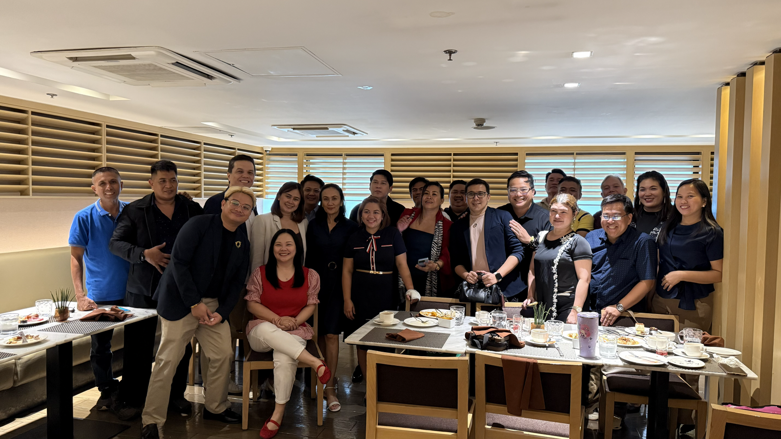 The Mega Paragon team sharing a meal together