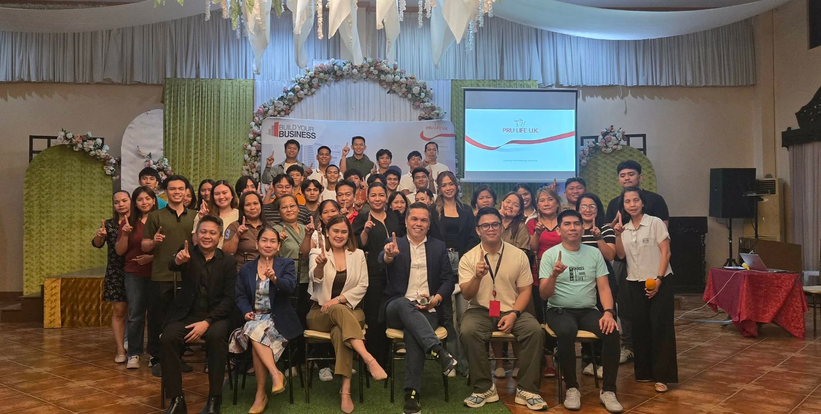 The Mega Paragon team gathered during a business event